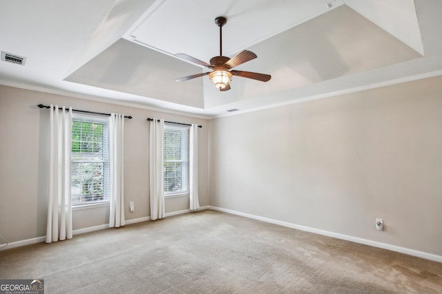 4284 Windy Gap Ct NW, Kennesaw, GA 30144 - carpeted spare room featuring baseboards, ornamental molding, visible vents, a tray ceiling, and ceiling fan