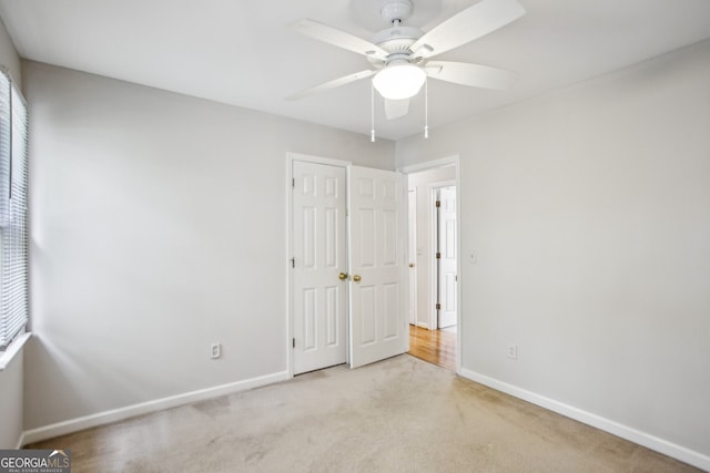 4284 Windy Gap Ct NW, Kennesaw, GA 30144 - unfurnished bedroom featuring carpet flooring and a ceiling fan