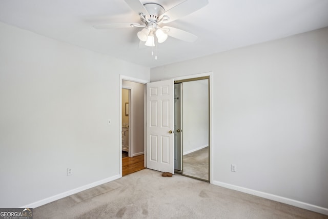 4284 Windy Gap Ct NW, Kennesaw, GA 30144 - unfurnished bedroom featuring carpet flooring, a closet, and ceiling fan