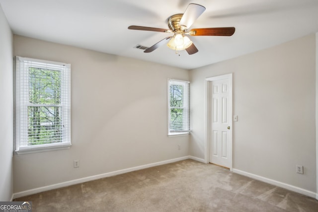4284 Windy Gap Ct NW, Kennesaw, GA 30144 - unfurnished room with a healthy amount of sunlight, baseboards, visible vents, and carpet floors