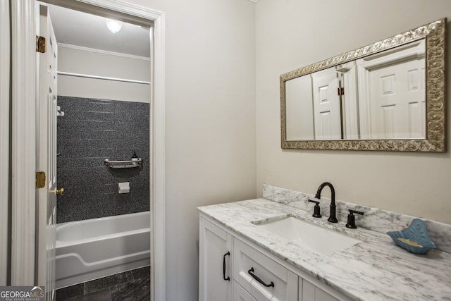 4284 Windy Gap Ct NW, Kennesaw, GA 30144 - bathroom featuring vanity, washtub / shower combination, and crown molding
