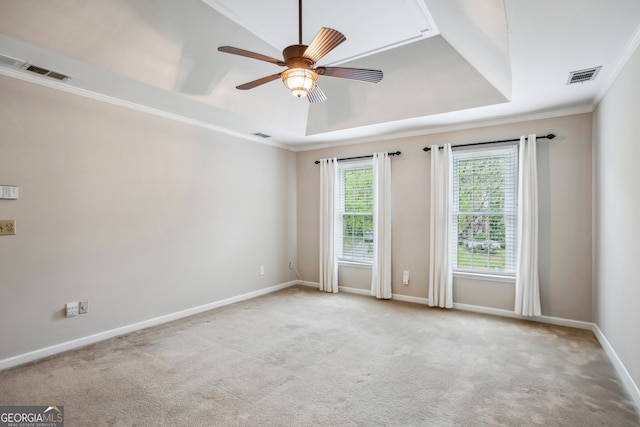 4284 Windy Gap Ct NW, Kennesaw, GA 30144 - carpeted empty room with crown molding, visible vents, a raised ceiling, and a ceiling fan
