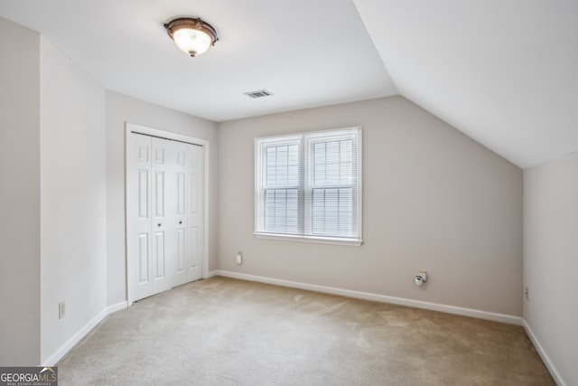 4284 Windy Gap Ct NW, Kennesaw, GA 30144 - additional living space with visible vents, carpet flooring, baseboards, and lofted ceiling