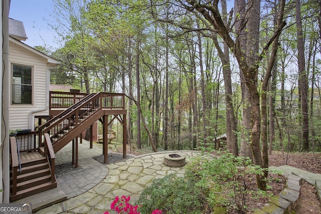 4284 Windy Gap Ct NW, Kennesaw, GA 30144 - view of patio / terrace featuring stairs, a fire pit, and a deck