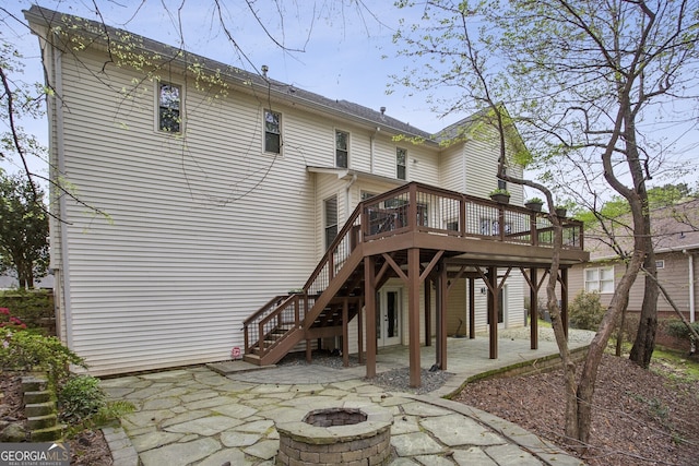 4284 Windy Gap Ct NW, Kennesaw, GA 30144 - rear view of property featuring an outdoor fire pit, a patio area, a deck, and stairs