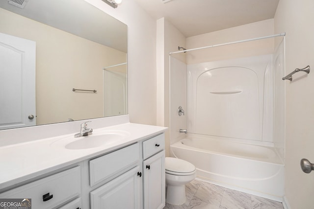 bathroom featuring vanity, visible vents, marble finish floor, toilet, and bathtub / shower combination
