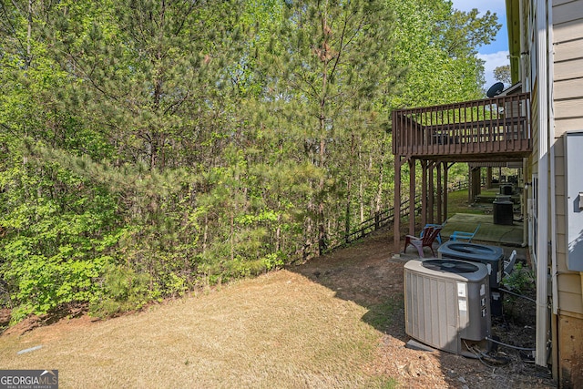 view of yard with central AC