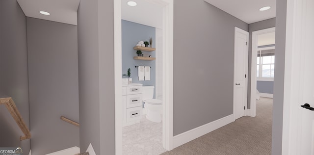 hall featuring baseboards, carpet flooring, an upstairs landing, and recessed lighting