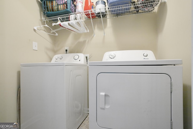 45 Hunters Ridge Ct, Covington, GA 30014 - clothes washing area featuring laundry area and washing machine and dryer