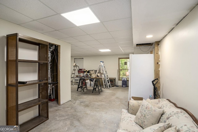 below grade area featuring a paneled ceiling