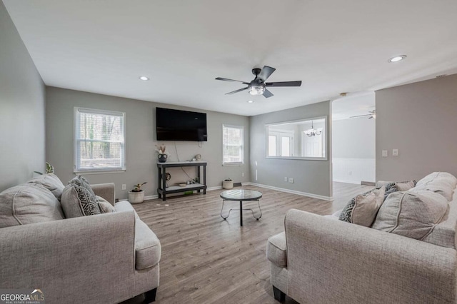 182 Hickory Dr, Ringgold, GA 30736 - living room with light wood-style flooring, ceiling fan, baseboards, and recessed lighting