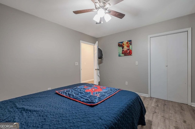 182 Hickory Dr, Ringgold, GA 30736 - bedroom with baseboards, a ceiling fan, and wood finished floors