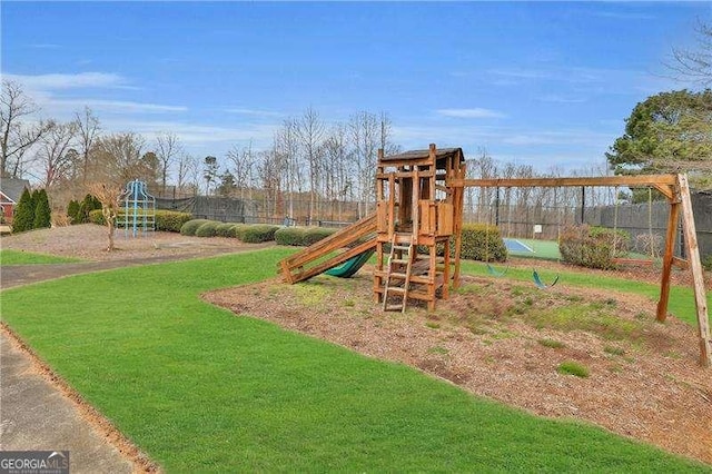 view of play area featuring a lawn