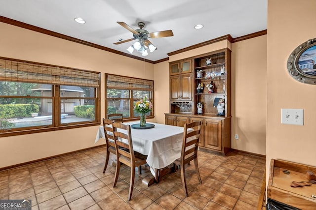 dining space featuring ornamental molding, a ceiling fan, recessed lighting, and baseboards