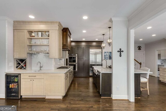 6201 Neely Farm Dr, Peachtree Corners, GA 30092 - kitchen featuring wine cooler, appliances with stainless steel finishes, a sink, crown molding, and light countertops