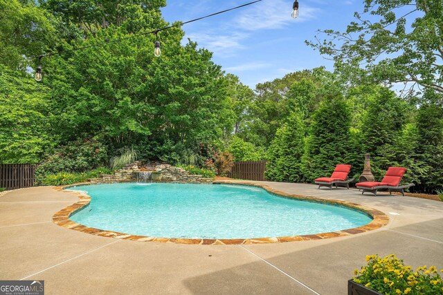 6201 Neely Farm Dr, Peachtree Corners, GA 30092 - view of swimming pool featuring a patio area and fence