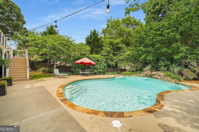 6201 Neely Farm Dr, Peachtree Corners, GA 30092 - view of swimming pool featuring stairway, a patio, and a fenced backyard