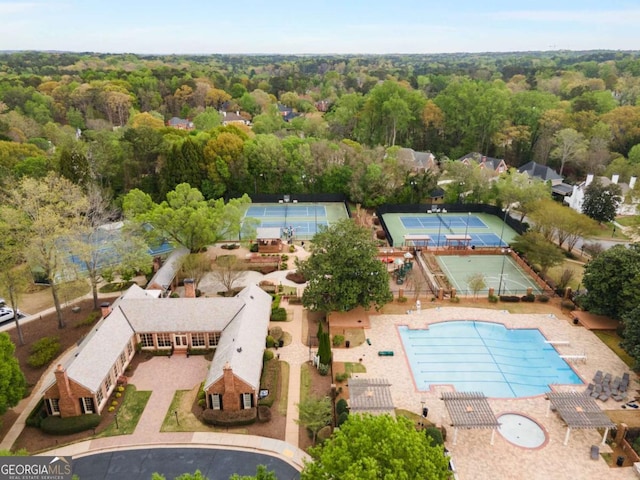 6201 Neely Farm Dr, Peachtree Corners, GA 30092 - bird's eye view of a pool and a heavily wooded area