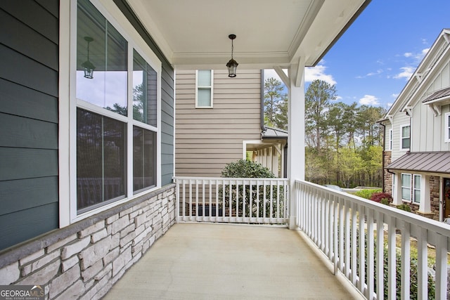balcony featuring a porch