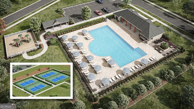 1612 Oakbrook Pond Pl, Dacula, GA 30019 - view from above of property with a pool area