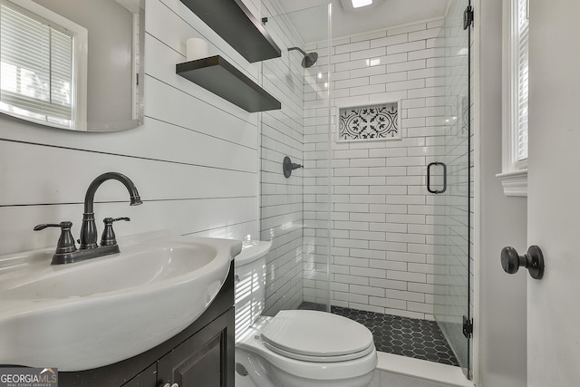 325 Sweetbriar Ln, Griffin, GA 30224 - bathroom featuring a shower stall, vanity, and toilet
