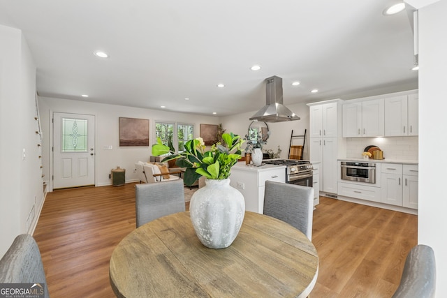 388 Pine Trl, Canton, GA 30115 - dining room featuring recessed lighting, light wood finished floors, and baseboards