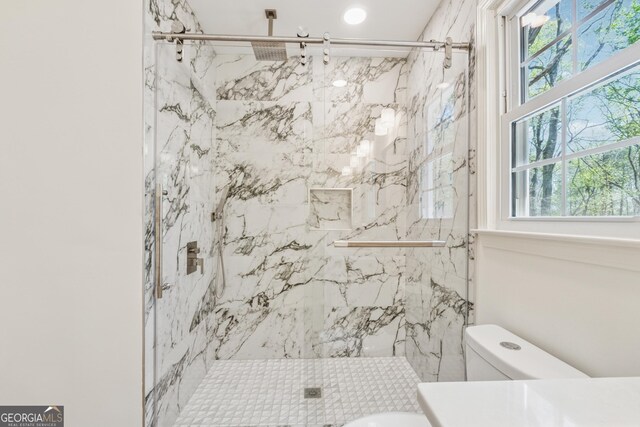 388 Pine Trl, Canton, GA 30115 - full bathroom featuring vanity, a marble finish shower, and toilet