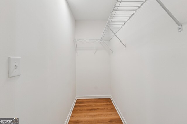 388 Pine Trl, Canton, GA 30115 - walk in closet featuring light wood-type flooring