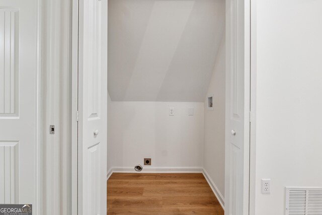388 Pine Trl, Canton, GA 30115 - laundry room with laundry area, light wood-style floors, hookup for a washing machine, visible vents, and hookup for an electric dryer