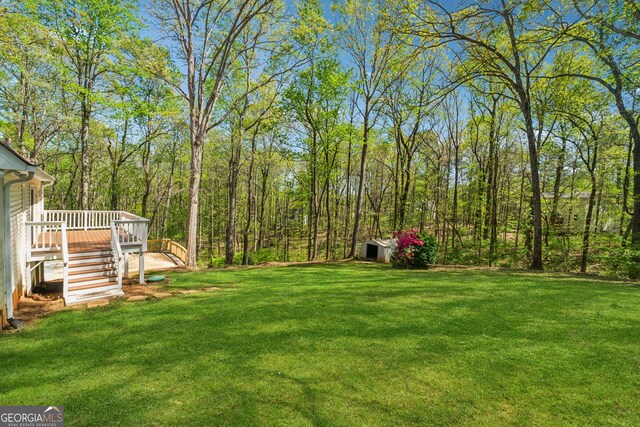 388 Pine Trl, Canton, GA 30115 - view of yard with a wooden deck and stairway