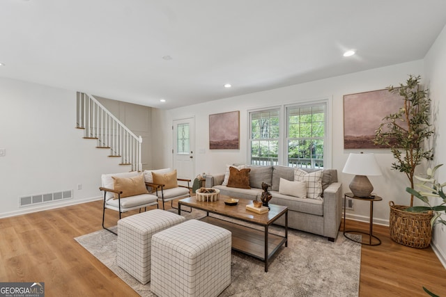388 Pine Trl, Canton, GA 30115 - living area with light wood-type flooring, recessed lighting, visible vents, and stairs