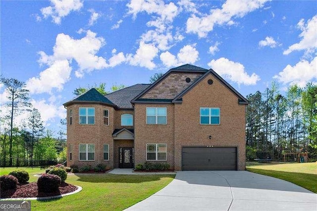 view of front facade with a garage, brick siding, driveway, and a front lawn
