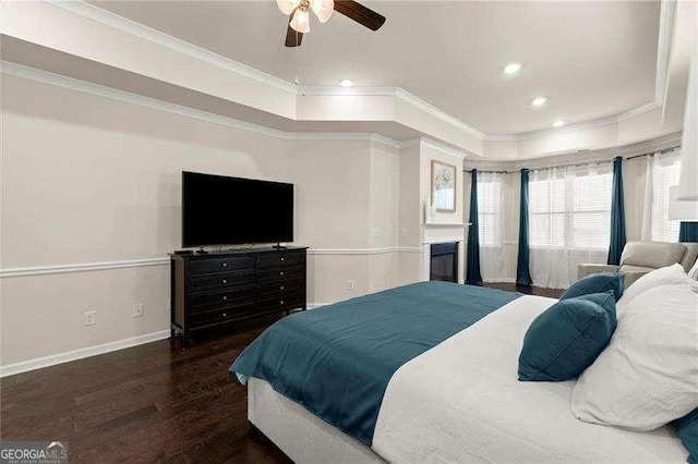 bedroom with wood finished floors, baseboards, ornamental molding, and recessed lighting