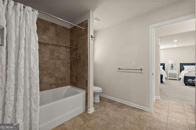 bathroom with baseboards, tile patterned floors, ensuite bath, toilet, and shower / bath combo with shower curtain