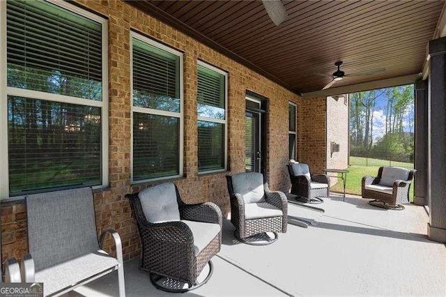 view of patio / terrace with a porch and a ceiling fan
