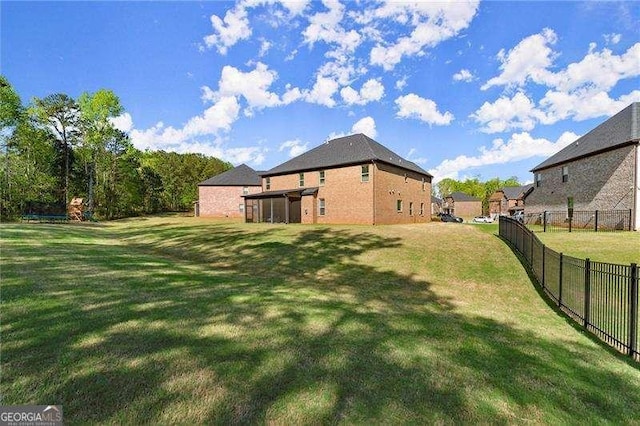 view of yard featuring fence