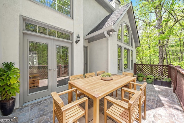 view of patio / terrace with french doors and outdoor dining area
