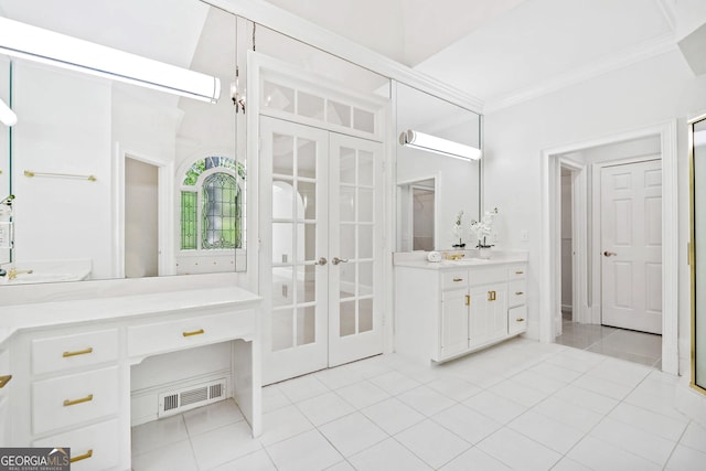 bathroom with vanity, tile patterned flooring, french doors, crown molding, and visible vents