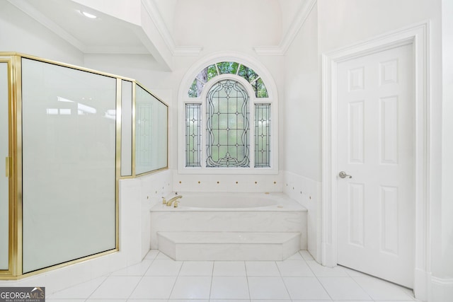full bath with tile patterned flooring, a bath, ornamental molding, and a stall shower