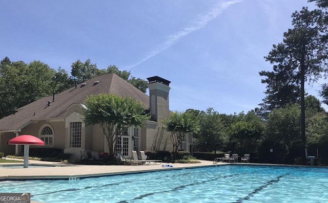 pool featuring a patio