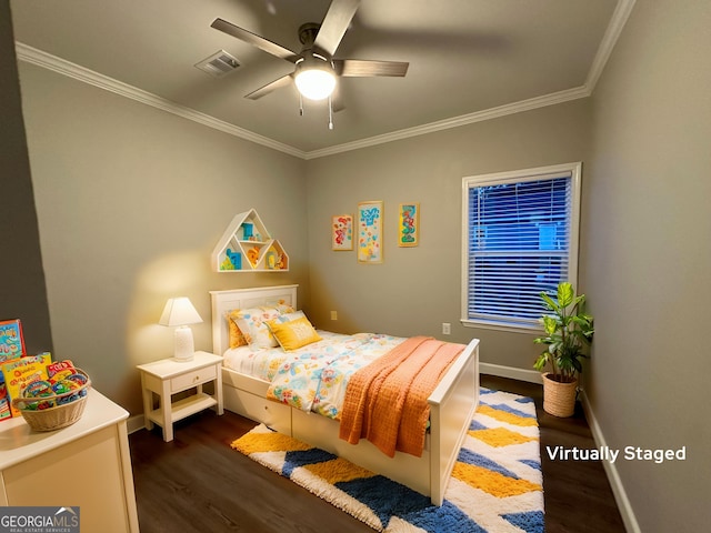 16 Pear St, Ludowici, GA 31316 - bedroom with dark wood-type flooring, visible vents, baseboards, and crown molding