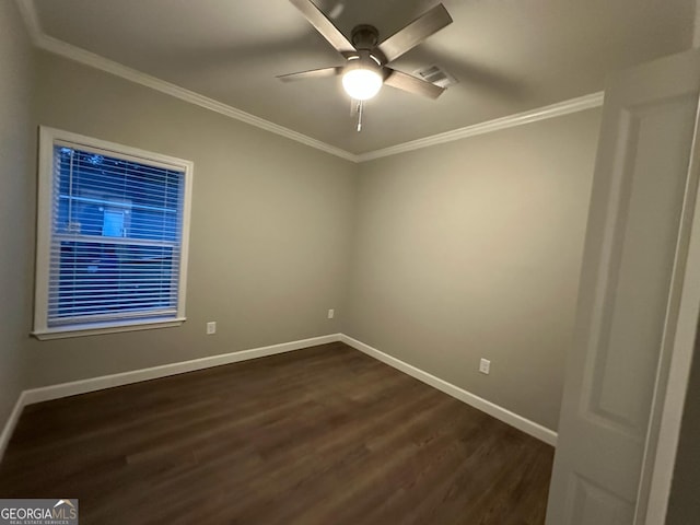 16 Pear St, Ludowici, GA 31316 - empty room featuring crown molding, ceiling fan, baseboards, and dark wood-style flooring
