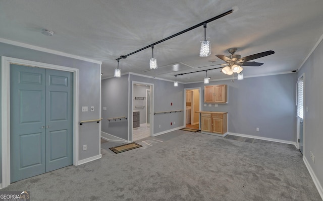 186 Foxdale Dr, Toccoa, GA 30577 - unfurnished living room featuring crown molding, ceiling fan, baseboards, and carpet