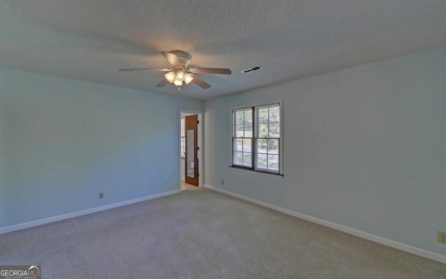 186 Foxdale Dr, Toccoa, GA 30577 - empty room with carpet floors, a ceiling fan, baseboards, and visible vents