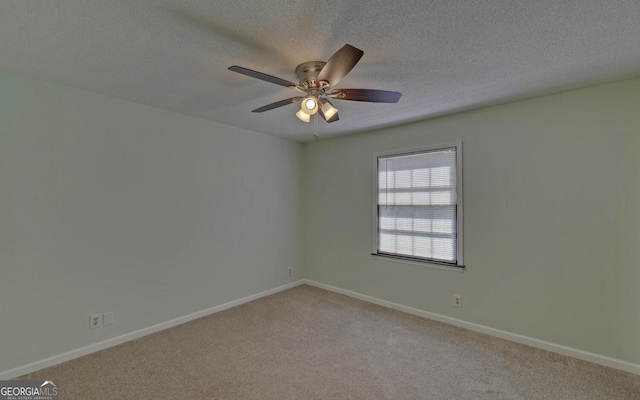 186 Foxdale Dr, Toccoa, GA 30577 - empty room featuring baseboards, a textured ceiling, ceiling fan, and light carpet