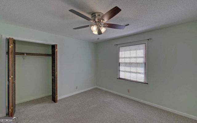 186 Foxdale Dr, Toccoa, GA 30577 - unfurnished bedroom with carpet flooring, a textured ceiling, and visible vents