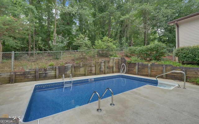 186 Foxdale Dr, Toccoa, GA 30577 - view of swimming pool with a fenced in pool and a fenced backyard