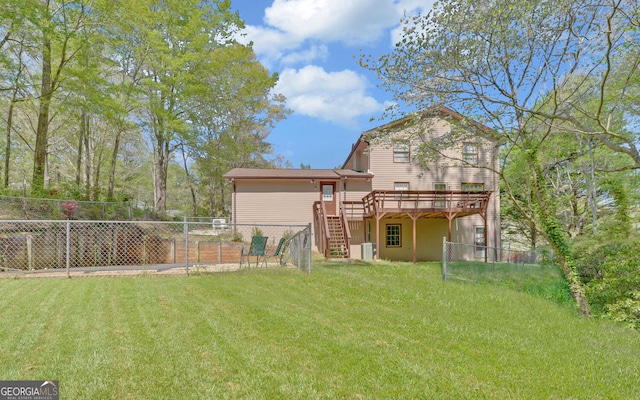 186 Foxdale Dr, Toccoa, GA 30577 - back of house with fence, a wooden deck, a yard, and stairway