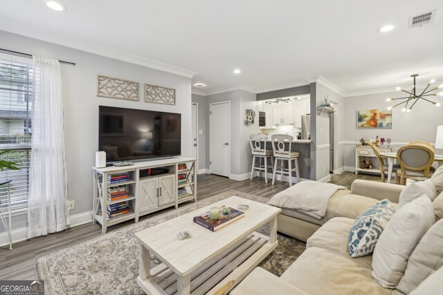 6820 Glenridge Dr Unit C, Sandy Springs, GA 30328 - living room with a chandelier, wood finished floors, recessed lighting, and ornamental molding