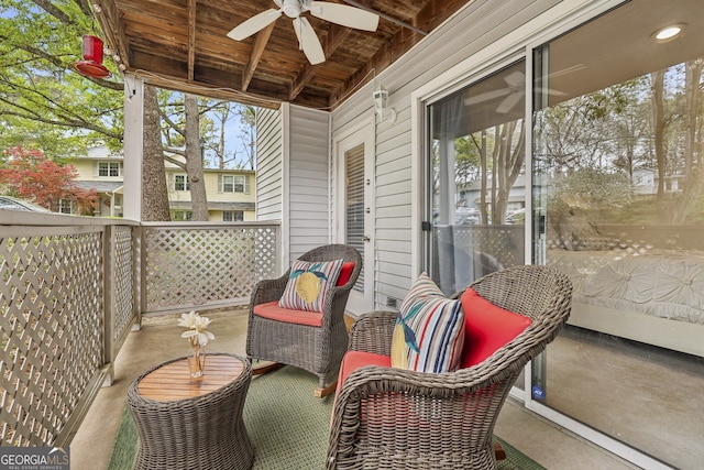 balcony featuring a ceiling fan